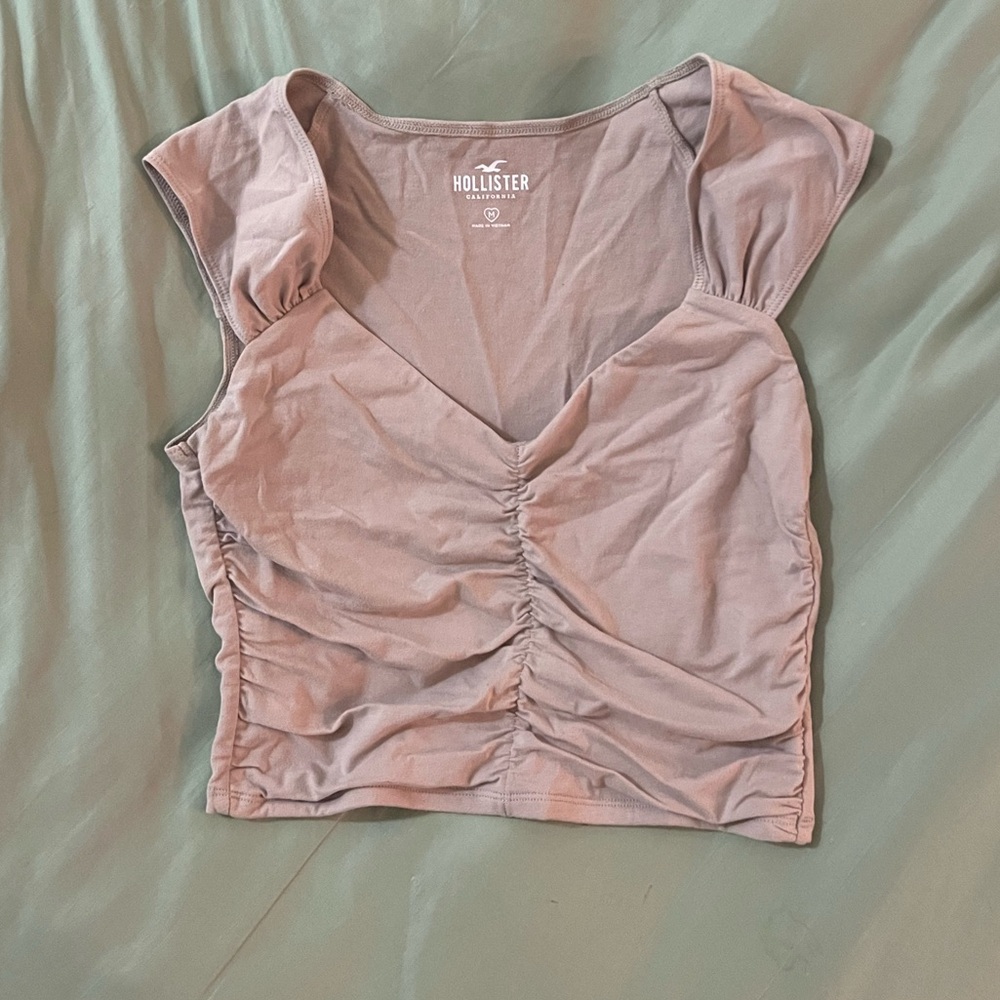 Light beige ruched cap sleeve shirt